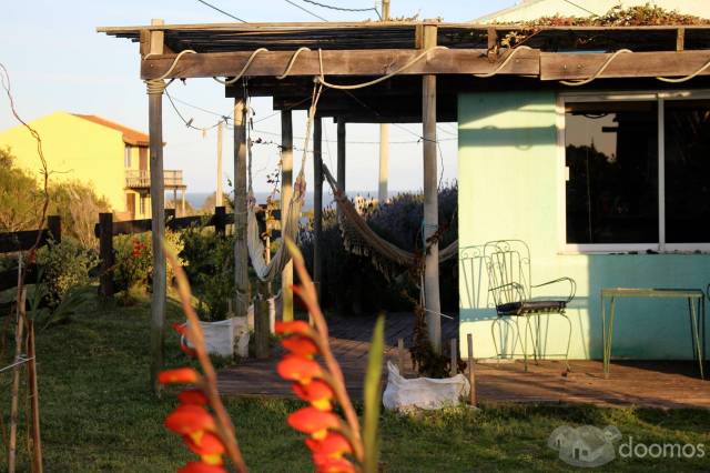Jardines del Diablo, 3 casas material en precioso jardin. 600 mts2, en alto con vistas al mar y todo en regla... 180000 U$D - 5
